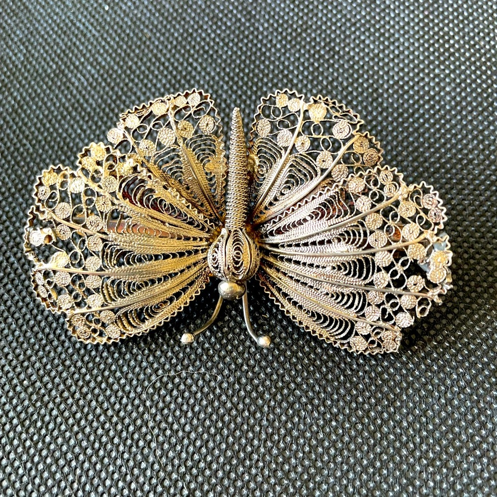 Filigree sterling silver butterfly brooch.